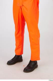 Shawn Jacobs Painter in Orange Covealls A Pose leg lower…